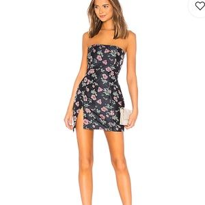 About us Mika mini dress